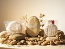 Plastic shower cap in a bag