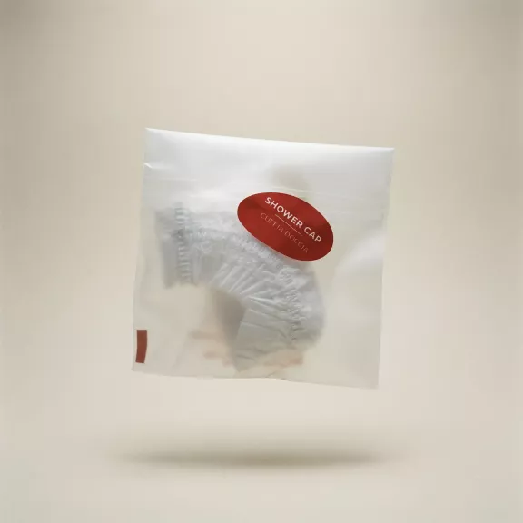 Touch line shower cap in sachet